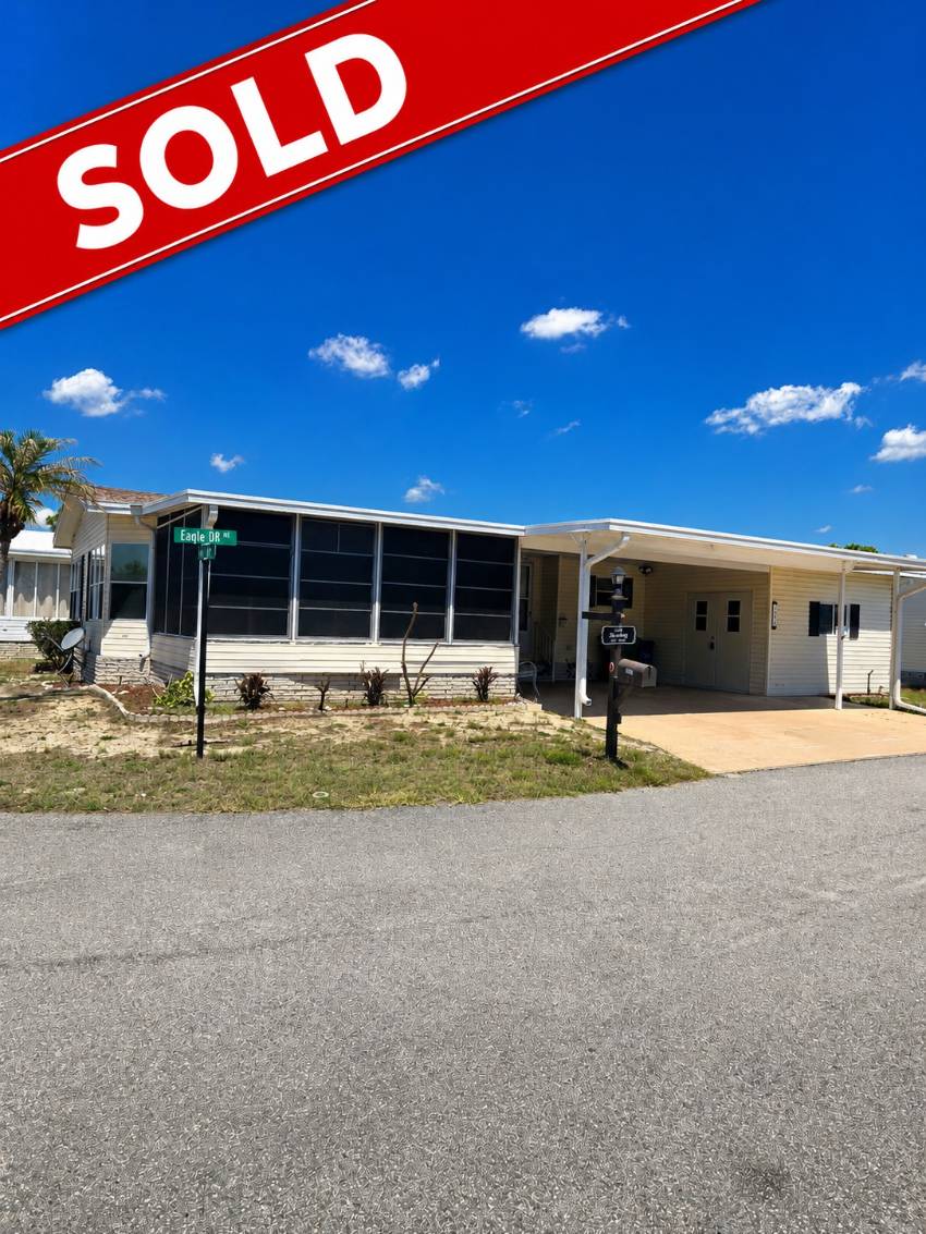 Winter Haven, FL Mobile Home for Sale located at 1082 Eagle Drive Swiss Golf & Tennis